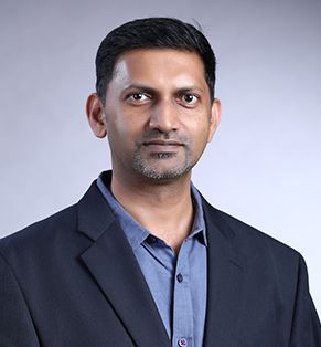 Dr. Dhinesh David